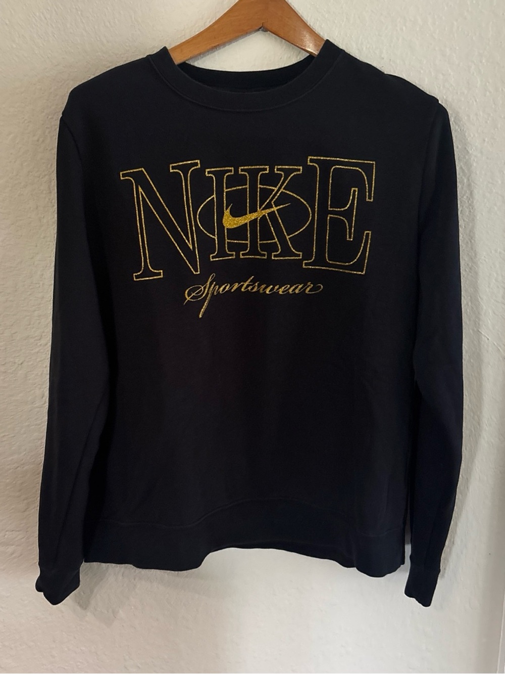 Nike Women’s Black Crewneck Sweatshirt with Gold Logo